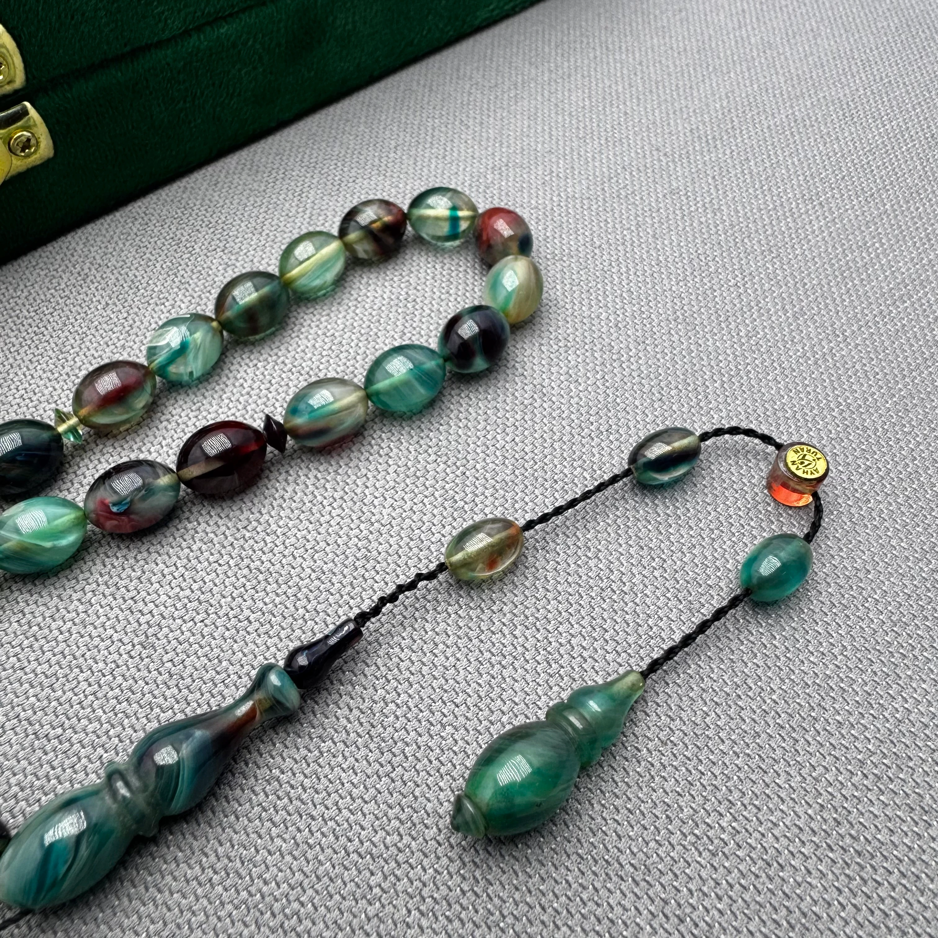 Ayhan TURAN Usta İşçilikli Hareli Renk Süzmeli Beyzi Kesim Ateş Kehribar Tespih